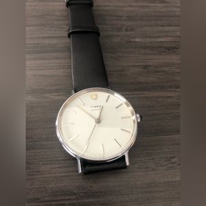 Vintage Timex Quartz Watch on black leather strap